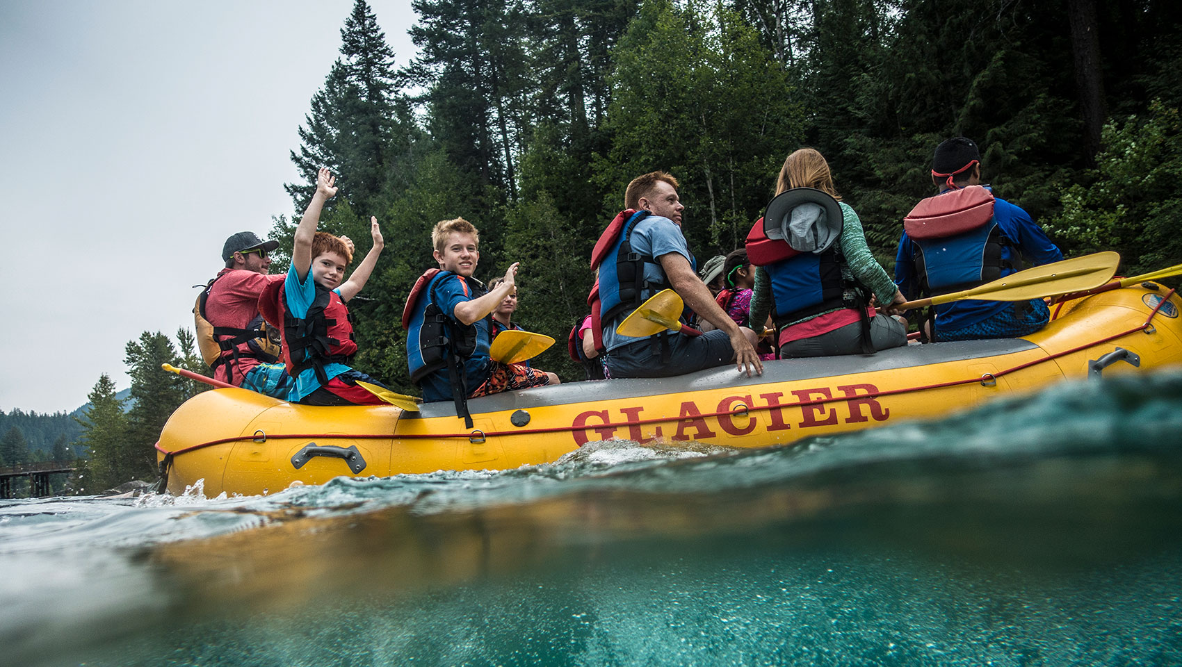 group of people in river raft