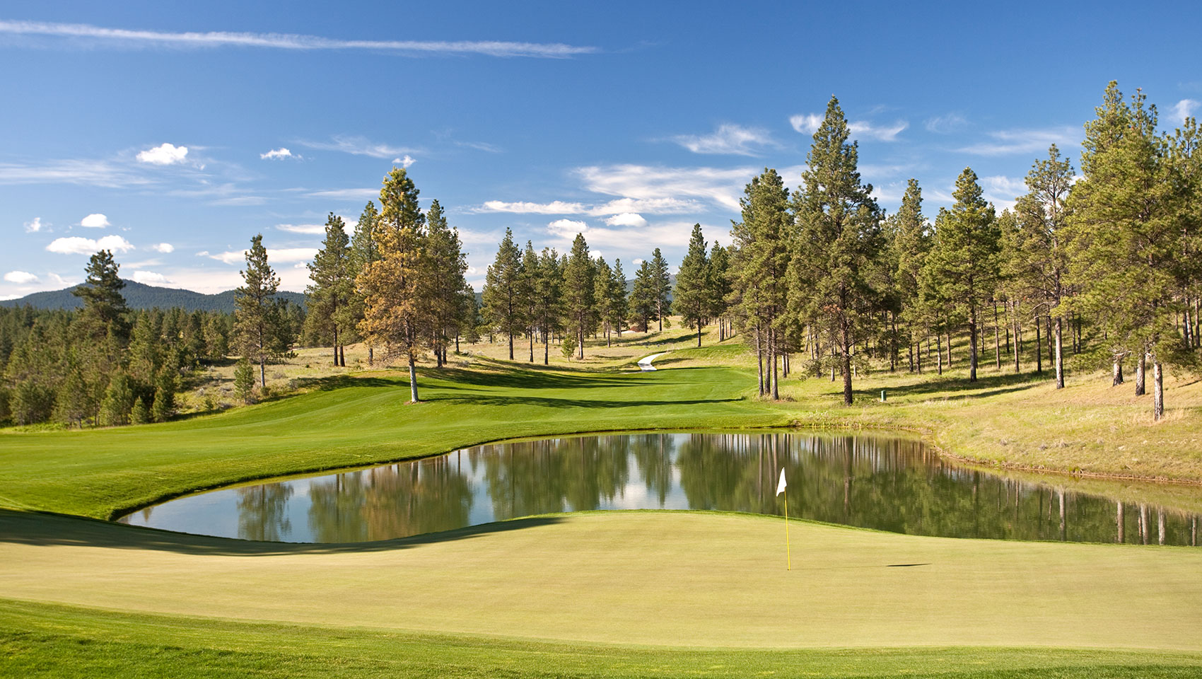 Scenic Montana golf course with view of mountains