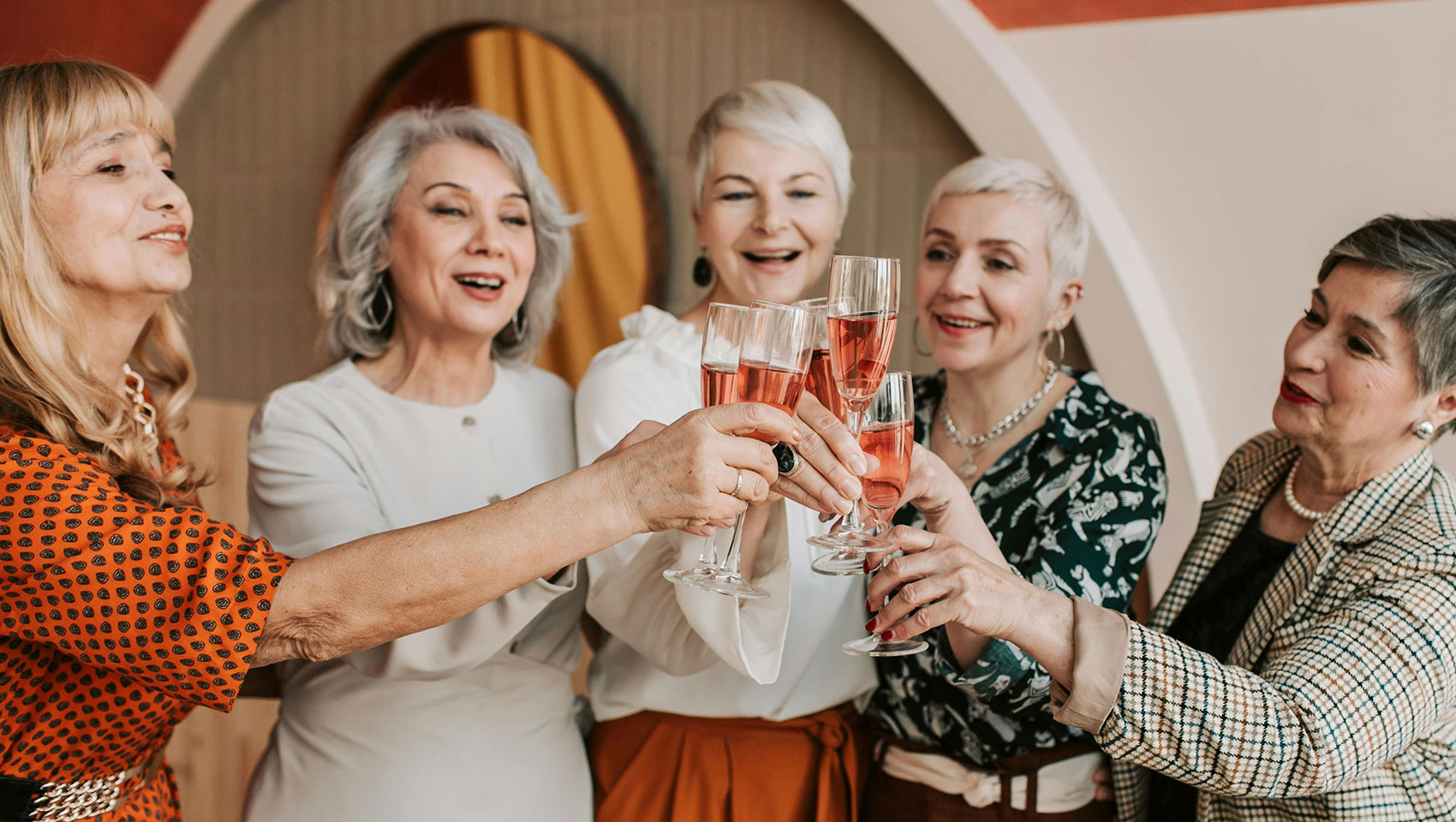 5 women cheersing