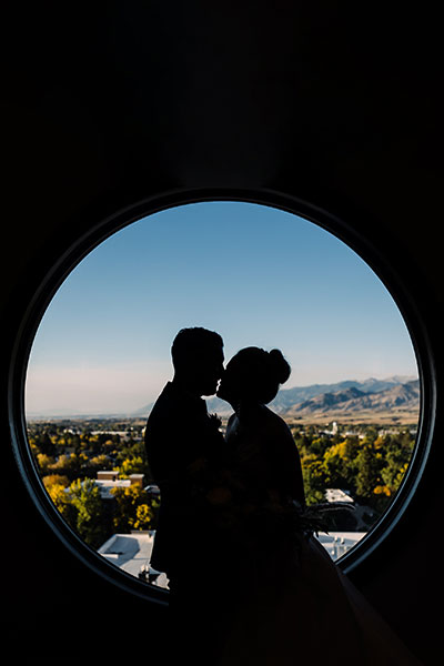 Lara and Rob pose in front of the “portal to paradise” on the 9th floor