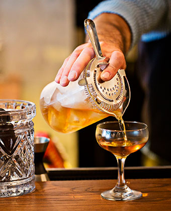 Bartender making cocktail