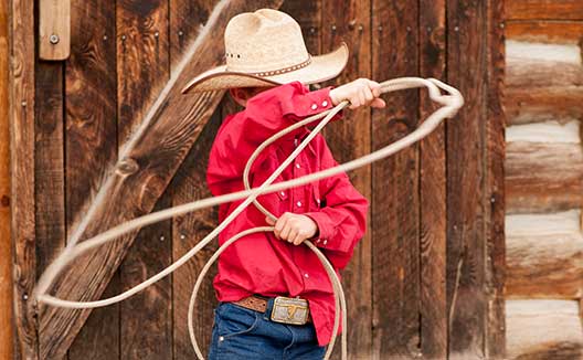 Child practicing roping