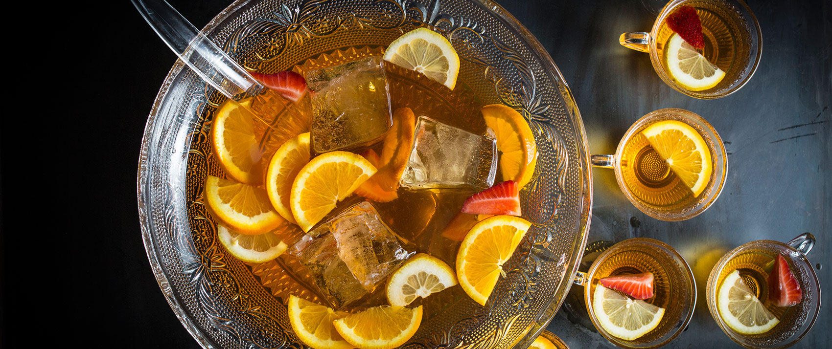 batch cocktail in a punch bowl